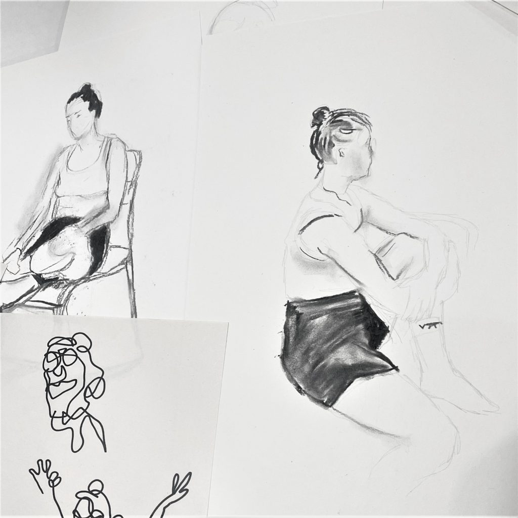 charcoal and pen life drawings of a woman